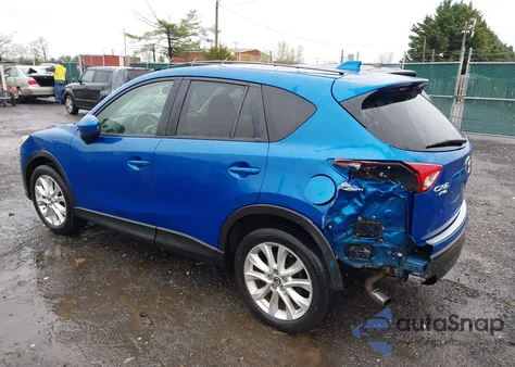 2013 Mazda Cx-5 Grand Touring z USA, uszkodzony, nr VIN JM3KE4DE0D0139257